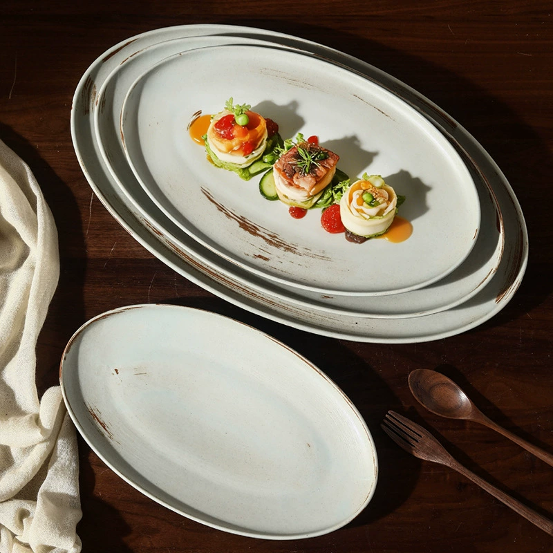 Plato ovalado de porcelana con acabado desgastado tableware view 3