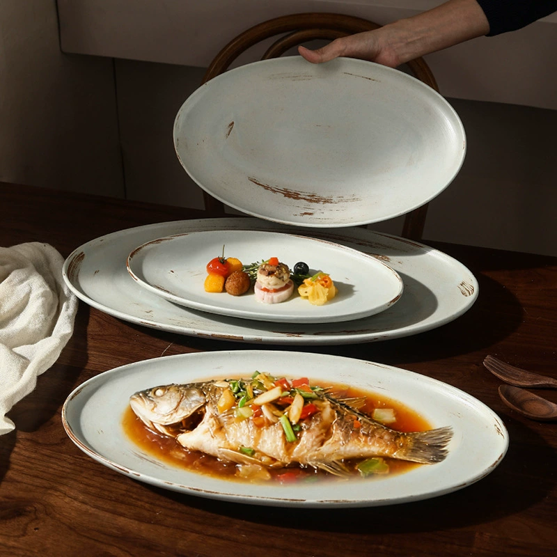 Plato ovalado de porcelana con acabado desgastado tableware view 4