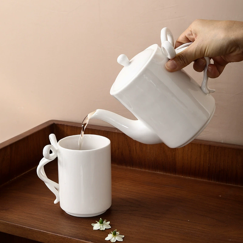 Porcelain Teapot with Bow Handle tableware view 2