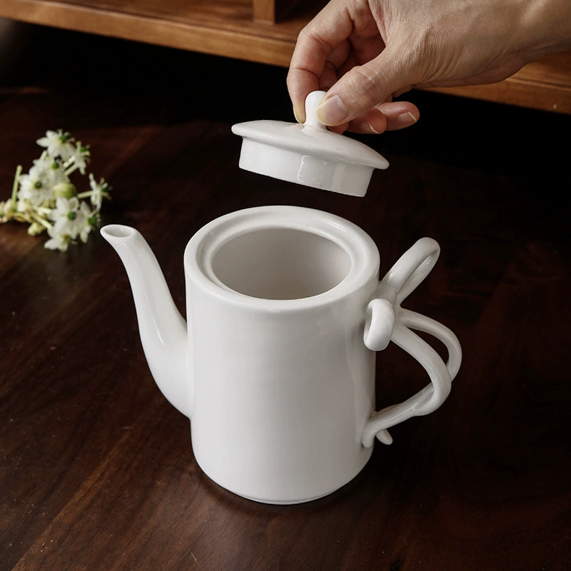 Porcelain Teapot with Bow Handle tableware view 4
