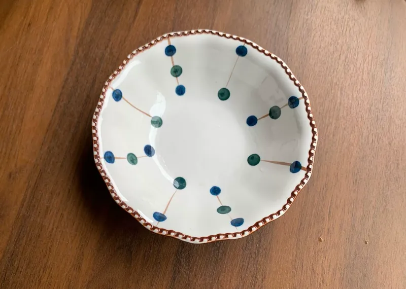 Bol à anse motif pois avec bord perlé