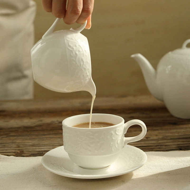 Relief Coffee Cup and Saucer Set with Milk Jug tableware view 2