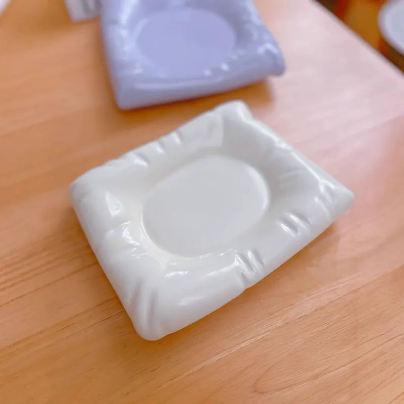 Plato de servir de cerámica creativo en forma de cojín