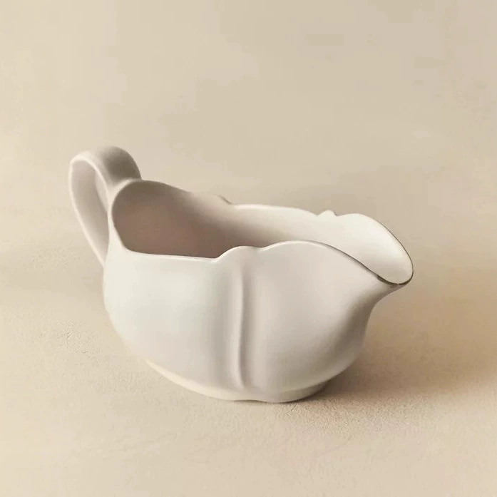How do you prevent breakage when shipping stoneware serving dishes?
